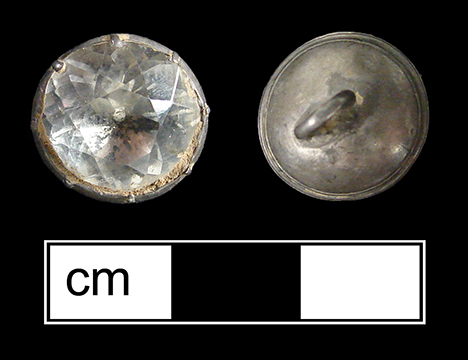 Solid silver sleeve link with a brilliant cut inset that is not made of glass. The lack of decay of the stone suggests that it is colorless quartz which was popularly known in the 17th and 18th centuries as Bristol stone. The cut is slightly asymmetric and the size is small, suggesting likely use as a linked button.